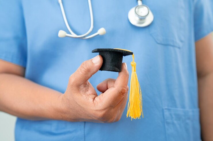 Aspiring medical student studying with textbooks and a stethoscope on the desk, symbolizing the journey and steps involved in becoming a doctor.