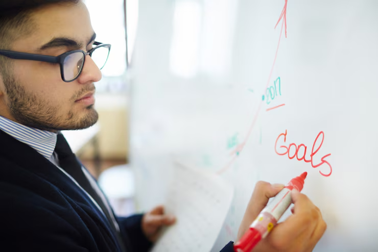 Student creating a study plan with textbooks, a planner, and highlighters — representing effective preparation strategies for the NSUT entrance exam.
